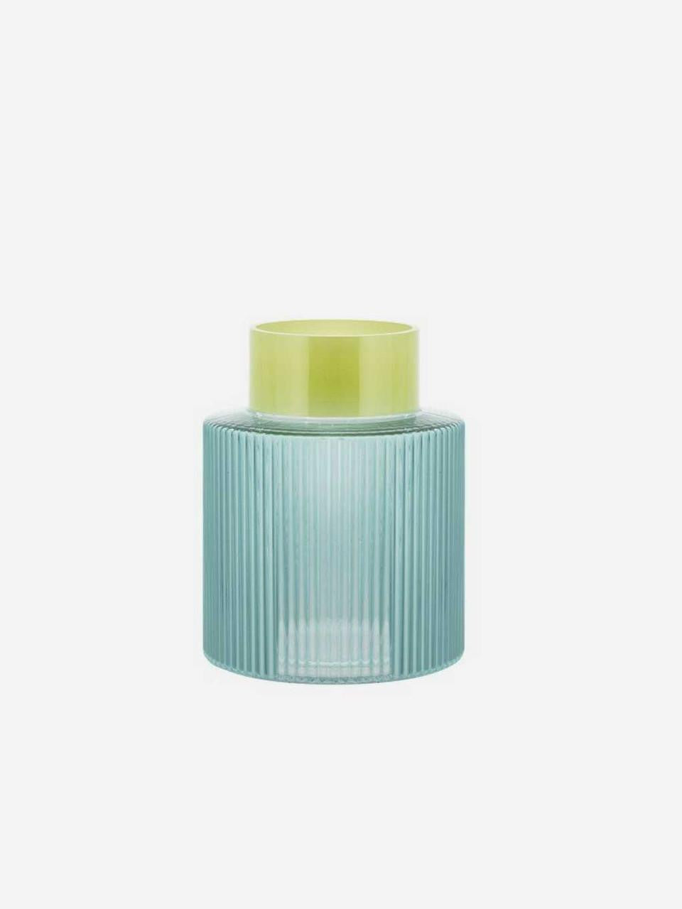 Blue fluted ceramic vase by Remember, featuring a textured design and classic shape for decorative floral arrangements.