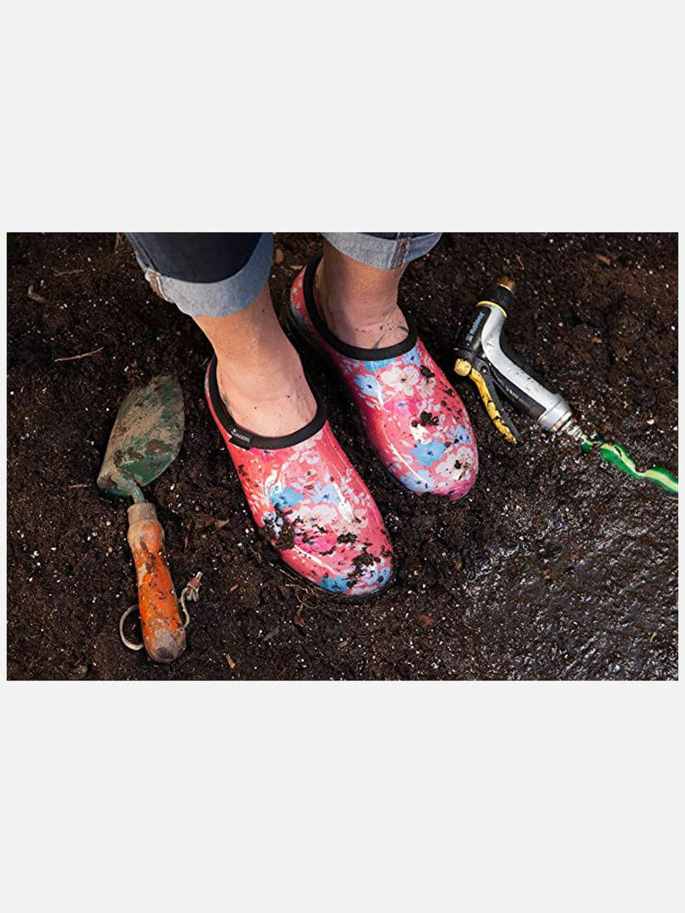 Women's floral rain shoes by Sloggers in Coral with colorful flower pattern and waterproof design.