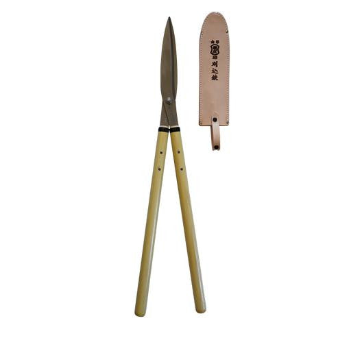 Tobisho Karikomi Shears with sharp blades and ergonomic handles for precise hair sectioning and styling.