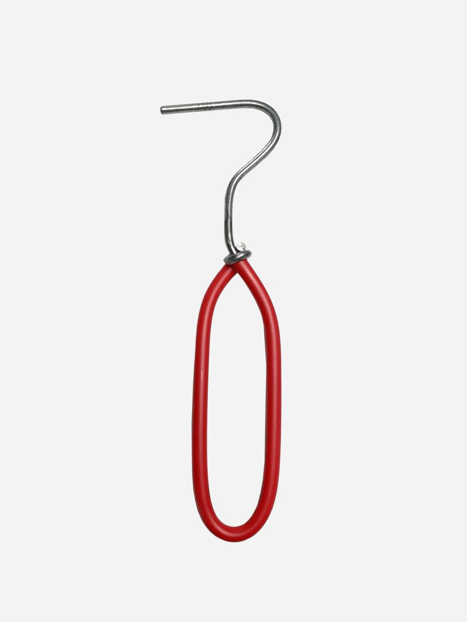 Close-up of the Wonder Weeder gardening tool showing its ergonomic handle and metal prongs for weeding and soil cultivation.